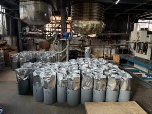 PUR reactive adhesive manufacturing workshop with stainless-steel storage tanks at Shanghai factory