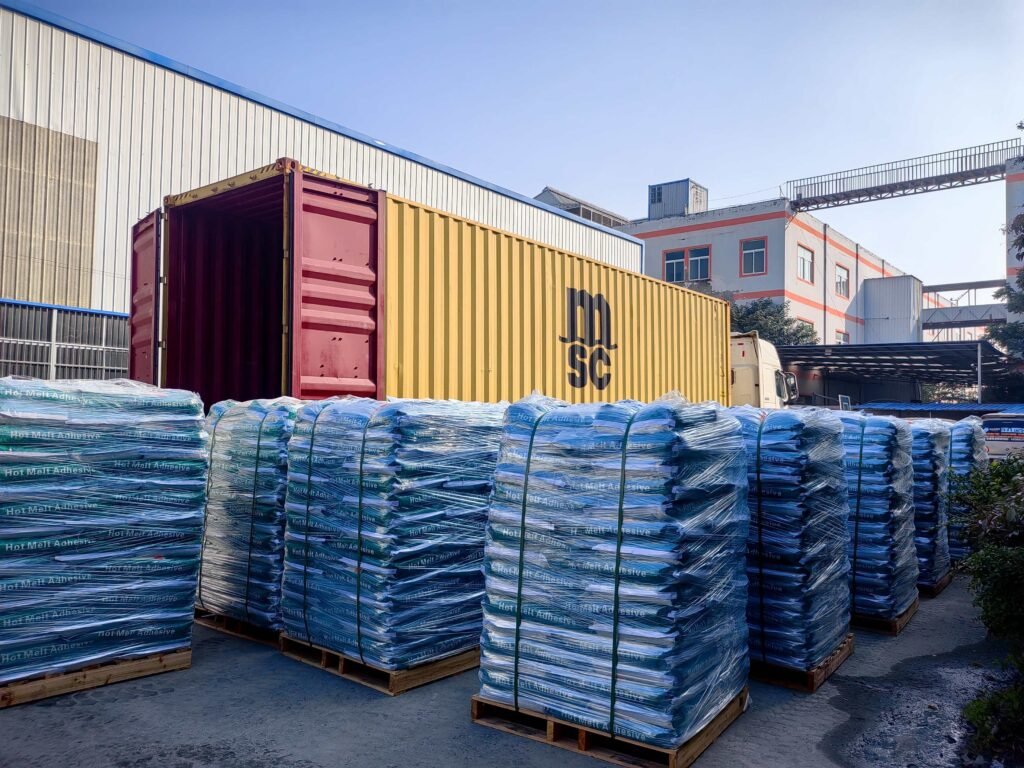 Hot melt adhesive bulk goods loaded for container shipping service at factory warehouse