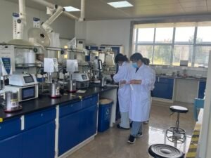 R&D team reviewing adhesive test data