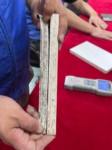 Hot melt adhesive bonding strength test on wood panel in laboratory
